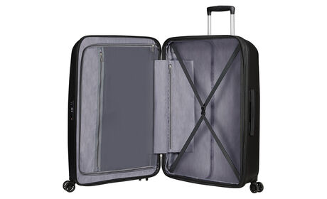 Sisällä pienempi vetoketjutasku tavaroille.